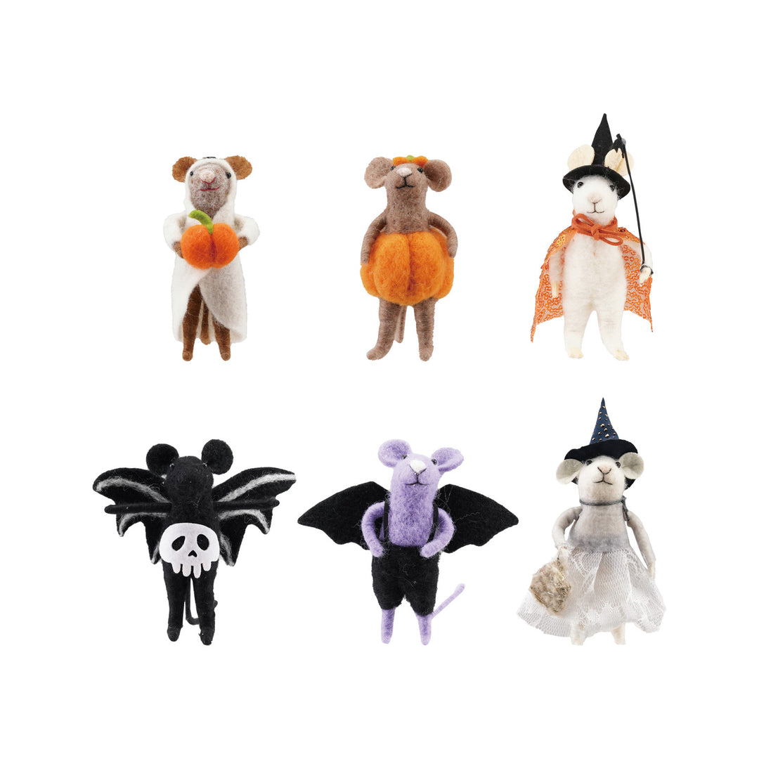 Set of Halloween-themed plush toys on a white background