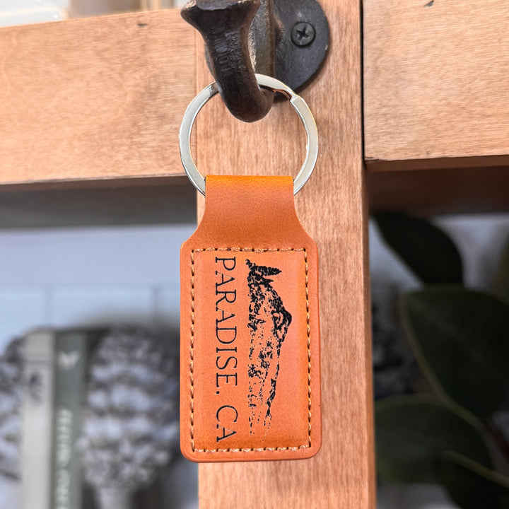 Brown leather keychain with &