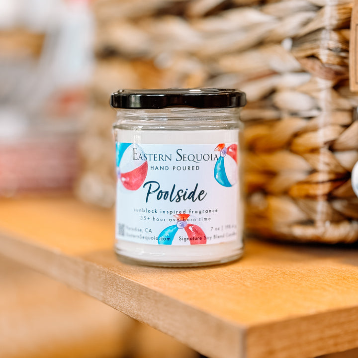 A 7oz jar candle labeled &