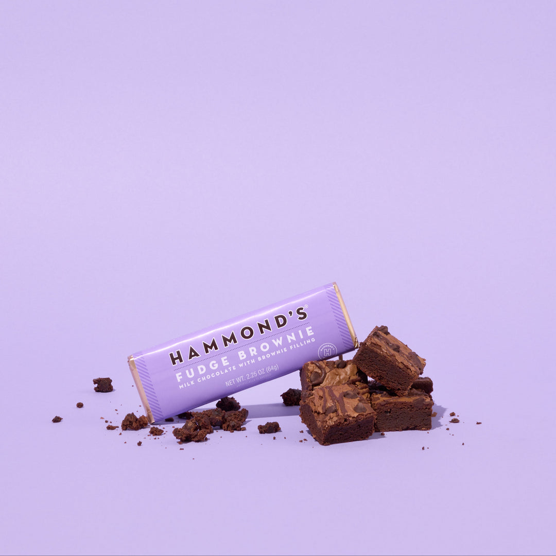 Hammond's Fudge Brownie packaging with brownies on a purple background
