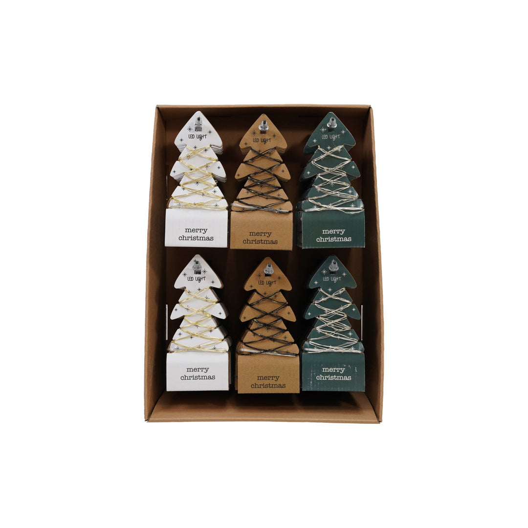Set of decorative Christmas trees in a box with &