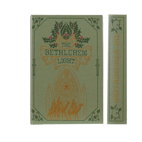 The Bible Light book and its matching book box, both in sage green with gold and dark green vintage-style illustrations and lettering.