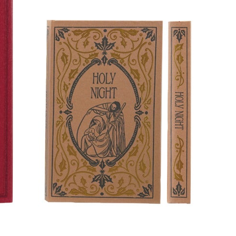 Holy Night prayer card set with a tan cover featuring a dark blue ornate border and illustration of the Virgin Mary and baby Jesus, shown alongside the spine of the card book.