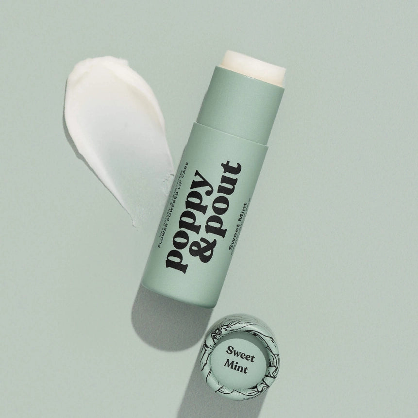 Green lip balm stick with &