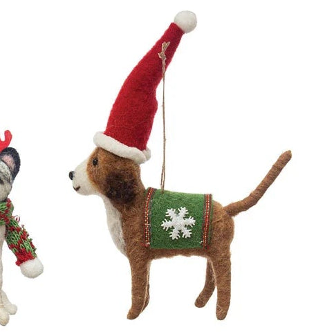 Set of four dog-shaped Christmas ornaments on a white background