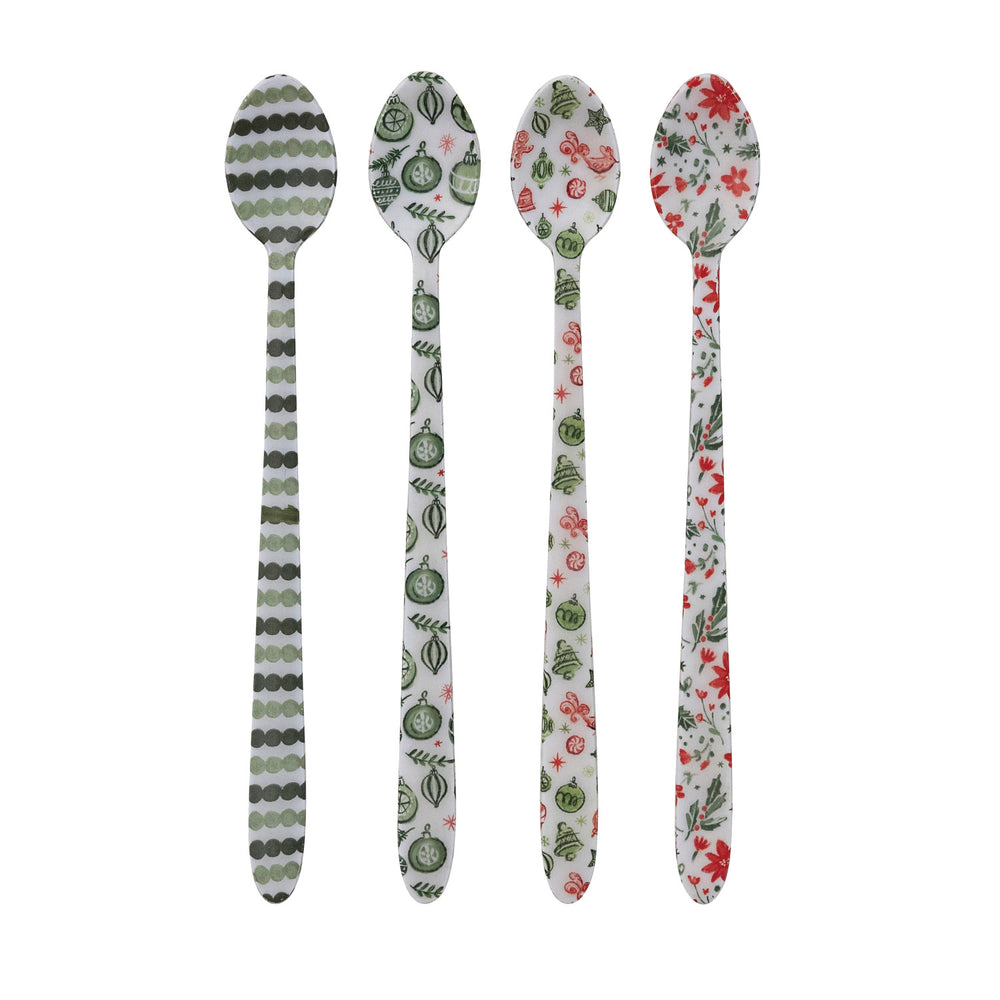 Four decorative kitchen spoons with patterned handles, displayed vertically on a plain white background. The spoons feature various designs including stripes, watermelons, cherries, and flowers.