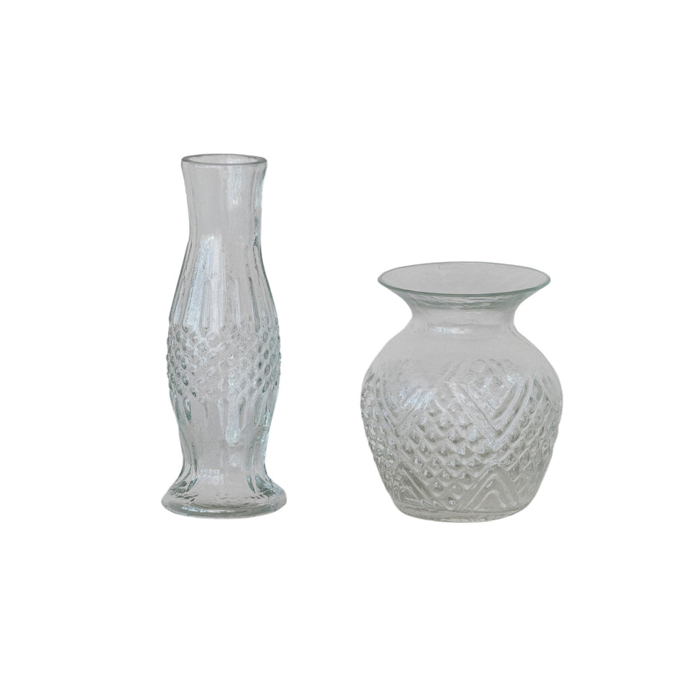 Two clear textured glass vases, one tall and slender with a diamond pattern and one short and rounded with a diamond pattern, shown on a white background.